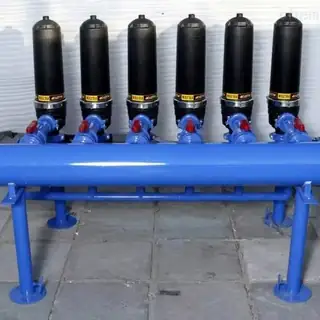 Centrifugal disc filter for agricultural water treatment
