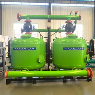 Backwash sand filtration system with stainless tanks